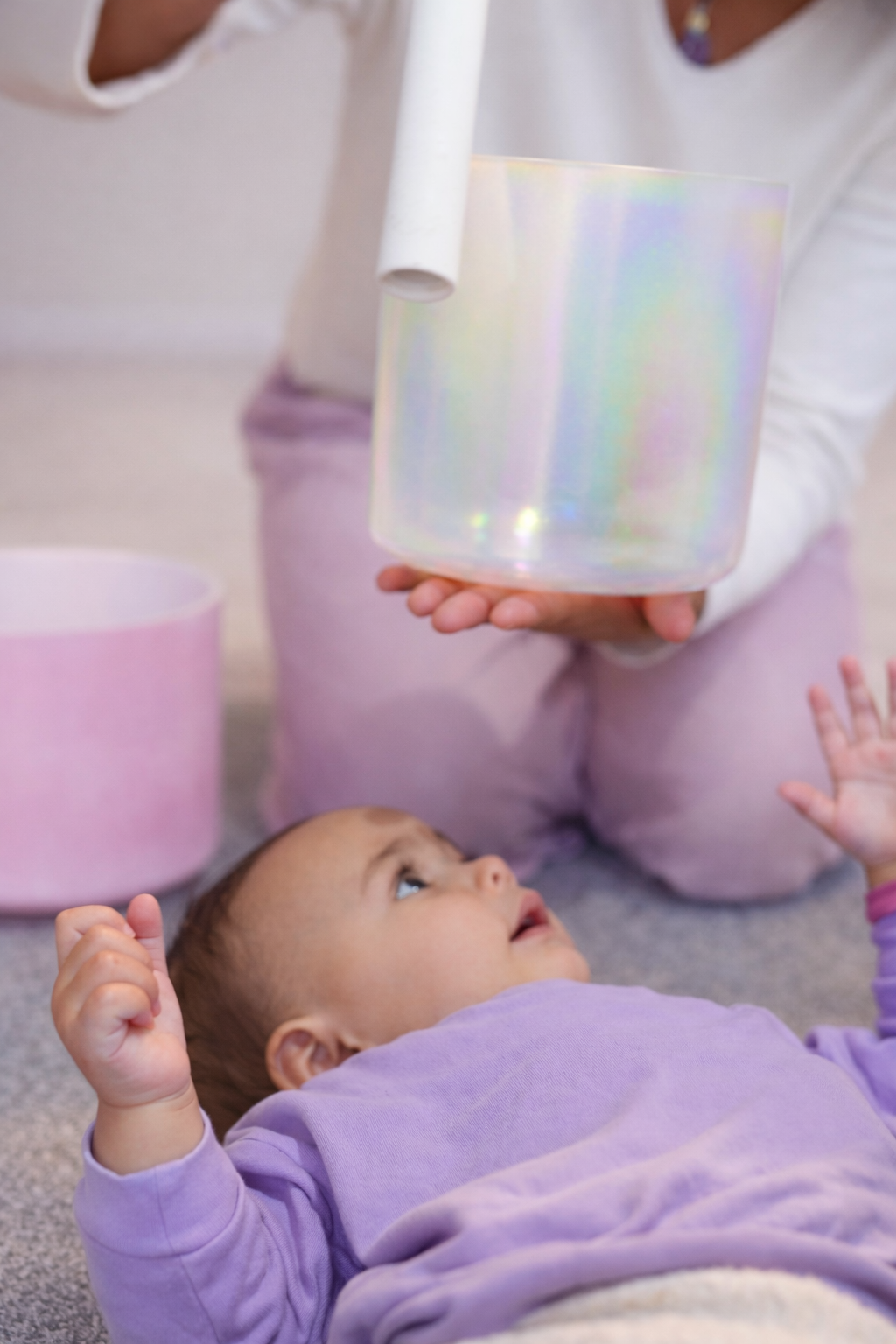 Iridescent crystal bowl over Olive's head